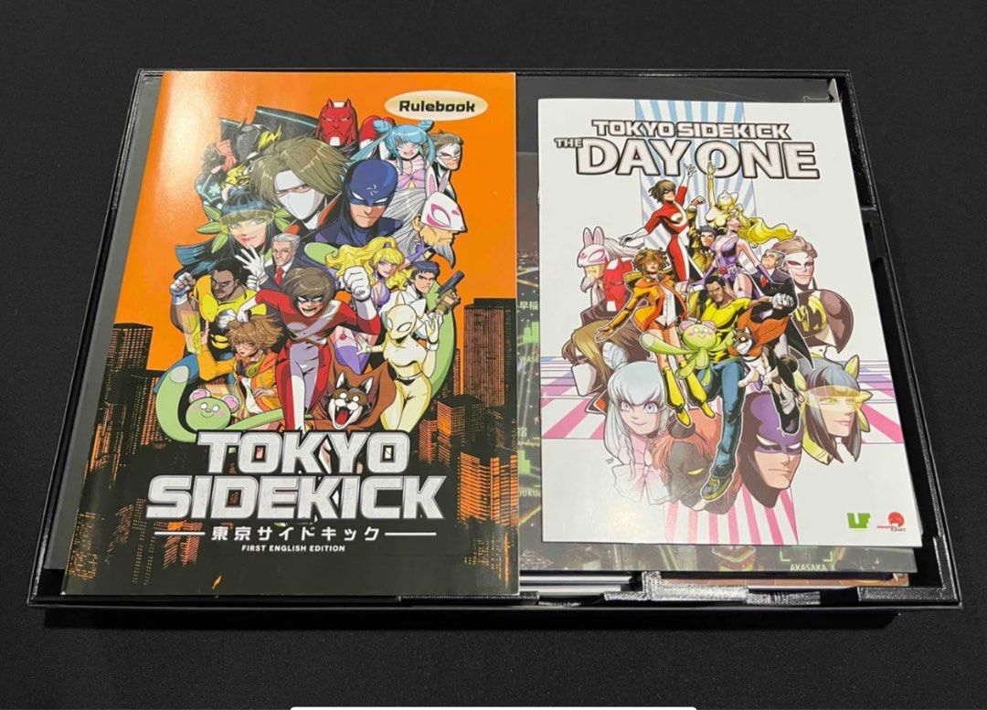 Tokyo Sidekick - Be a Hero and Save Tokyo! (Category: Board Games & Puzzles) located in Mandaluyong City. Submitted by jpetrulli (Listing ID 1359849227, Image 2). Description: Played only once! I love this game so much I got 2 copies! Step into the immersive world of Tokyo Sidekick, where you’ll control your own hero and sidekick team to defend the city from nefarious villains! This stunning cooperative game has such a big and beautiful table pre