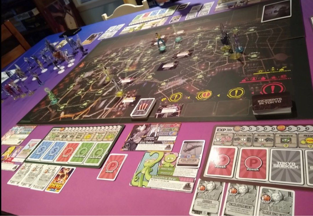 Tokyo Sidekick - Be a Hero and Save Tokyo! (Category: Board Games & Puzzles) located in Mandaluyong City. Submitted by jpetrulli (Listing ID 1359849227, Image 3). Description: Played only once! I love this game so much I got 2 copies! Step into the immersive world of Tokyo Sidekick, where you’ll control your own hero and sidekick team to defend the city from nefarious villains! This stunning cooperative game has such a big and beautiful table pre