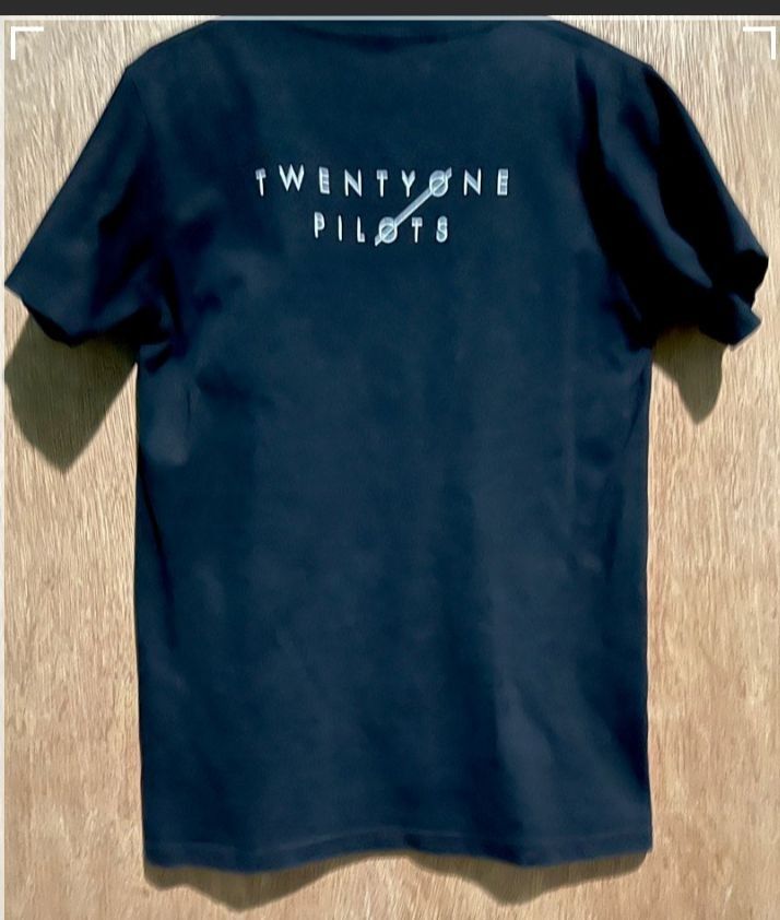 Twenty one pilots shirt (Category: Tshirts & Polo Shirts ) located in Makati City. Submitted by decluttering143 (Listing ID 1360034072, Image 2). Description: still in good condition Thailand brand band shirt size small.