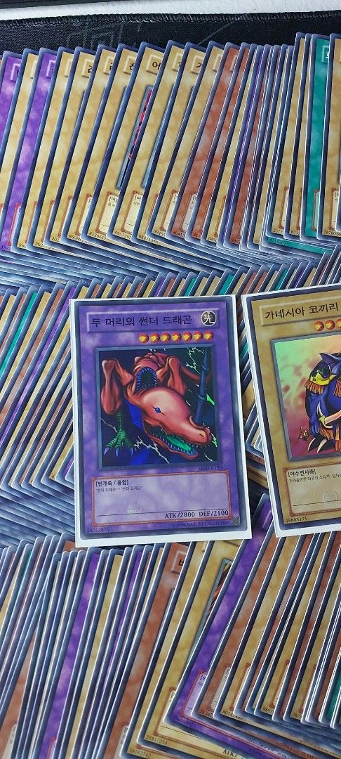 YuGiOh Korean MRD collection (Category: Raw Singles) located in Balanga. Submitted by coolballoon (Listing ID 1359906322, Image 2). Description: Take all MRD cards w/ 2 super rares. Di ko na nabilang sa dami. Marami rin rares sa loob. Di po kasama box Add nalang po kayo para sa shipping GCash LBC JNT.