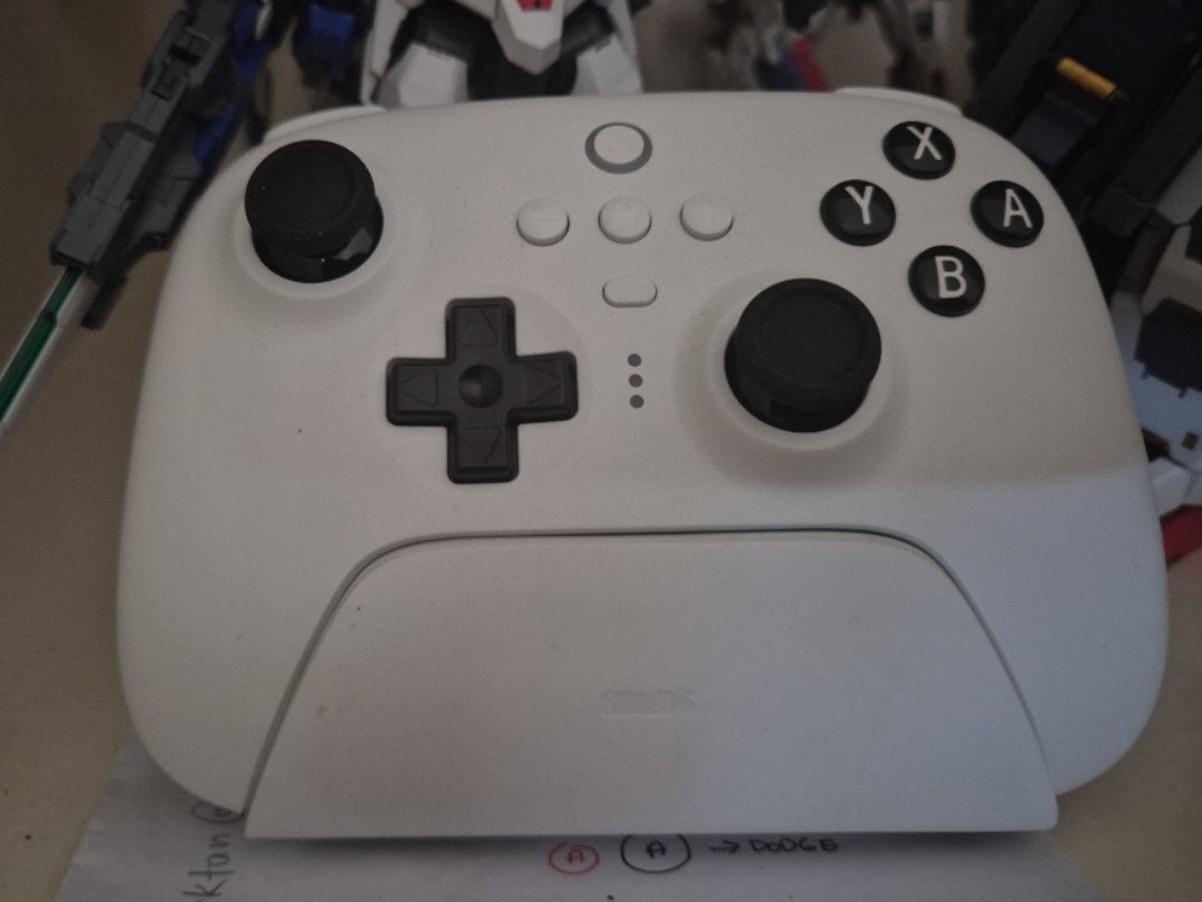 8bit do Ultimate Bluetooth Controller (Category: Controllers) located in Manila. Submitted by pipo_03 (Listing ID 1360068856, Image 2). Description: 8bit do Ultimate Bluetooth Controller with charging dock + Skull & Co hard case can be used for mobile, pc, and other platforms both items purchased last October 2024 only used 2x to check. no issues. all working like out of the box.