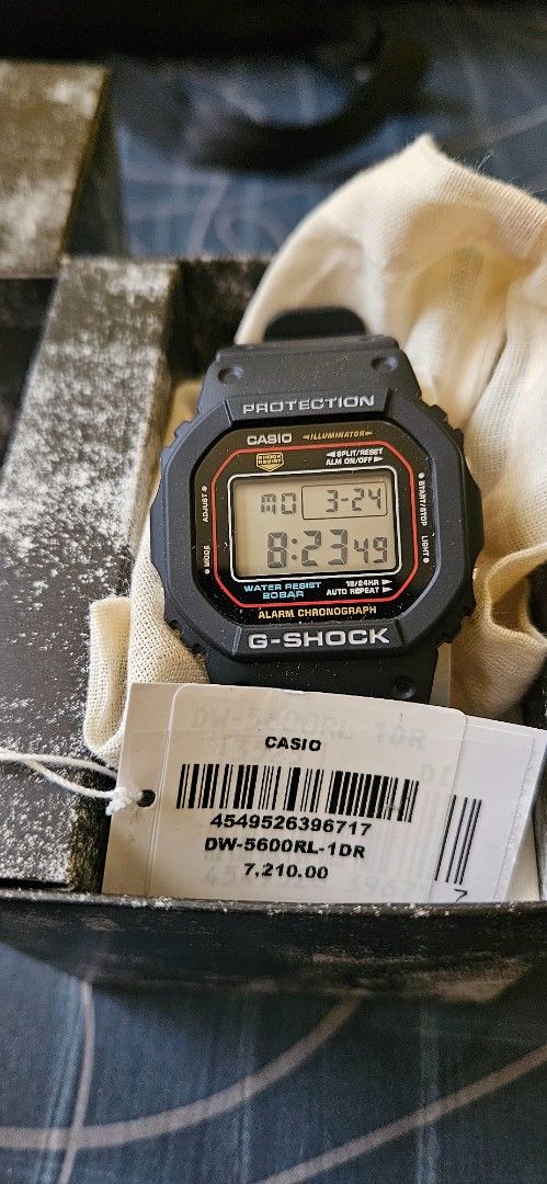 Casio Gshock DW5600RL-1DR (Category: Men's Watches) located in Tuguegarao City. Submitted by longdrive21 (Listing ID 1360041218, Image 1). Description: selling a gshock DW5600RL. bought at gshock store. complete with box and warranty card. RFS: Trimming down collection.