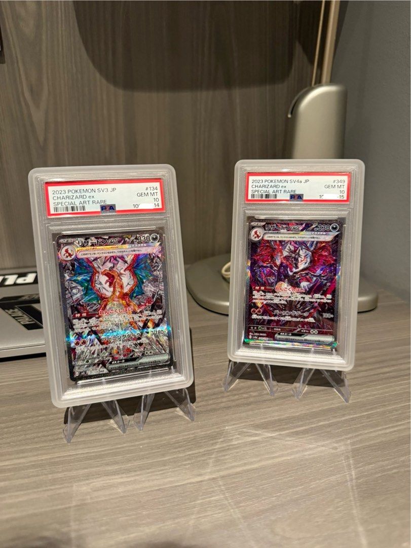 Charizard PSA10 Sequential (Category: Graded Cards) located in Singapore. Submitted by hene_is_regening (Listing ID 1360176461, Image 1). Description: RARE SEQUENTIAL CHARIZARD FROM RULER OF THE BLACK FLAME AND SHINY TREASURE SELLING AT $600, NO LOWBALL DOES NOT COME WITH GUARD.