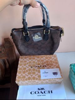 Coach mini hand bag with sling