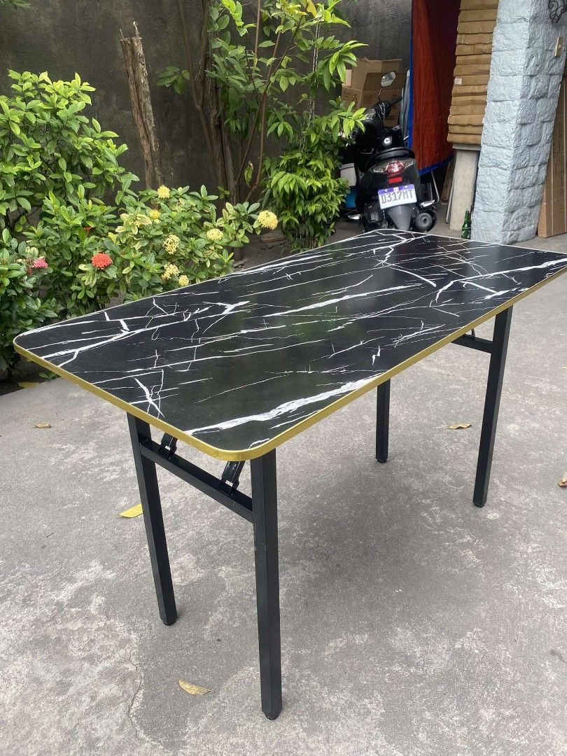 Foldable table black color siding (Category: Tables & Sets) located in Manila. Submitted by dolorchris69891 (Listing ID 1360067747, Image 1). Description: Foldable table Imus and manila.