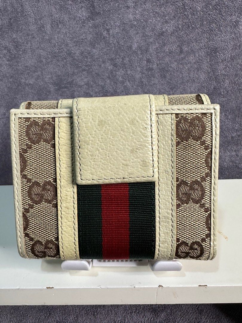 Gucci trifold small wallet (Category: Luxury Bags & Wallets) located in Sison. Submitted by legitsellerbuyer888 (Listing ID 1360090805, Image 3). Description: Nego sure buyer Flaws see pictures below Coded.