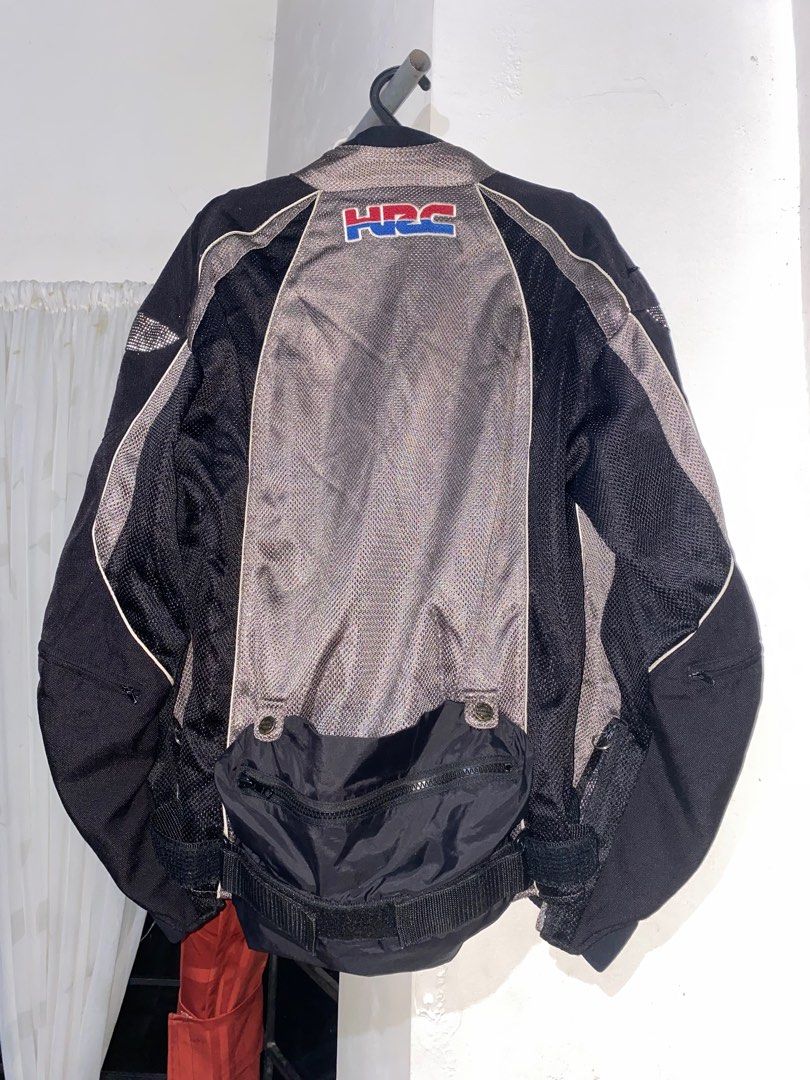 Honda Racing Corp. Riding Jacket (HRC) (Category: Coats, Jackets and Outerwear) located in Caloocan City. Submitted by miraclul7 (Listing ID 1360150662, Image 2). Description: Honda Racing Corporation Riding Jacket (HRC) Medium on tag Comes with detachable waist pack + waist and sleeve adjustments Comes with shoulder, arm and back padding slots Honda Emblem on zipper and buttons Good Condition Negotiable RFS: Need Funds.