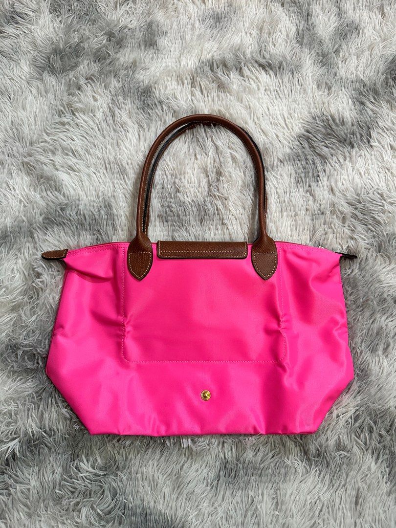 Longchamp Le Pliage Classic Long Handle (Category: Luxury Bags & Wallets) located in Makati City. Submitted by lux.mariah (Listing ID 1360064842, Image 2). Description: 💯Guaranteed Authentic Candy Medium size / Also available in Large size Accepting 1 and half month lay away with 50% downpayment. Brand new & Complete Inclusions • Care card - Dustbag - Paperbag We ship nationwide. Mode of payment: • Gcash - BDO - Maya Courier: • J&T - Lalamove.