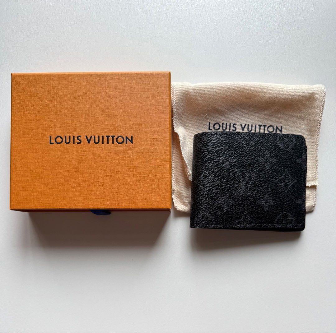 LV multiple wallet - Monogram eclipse (Category: Bags & Wallets) located in Singapore. Submitted by leessang (Listing ID 1360104978, Image 1). Description: I’m selling a lightly used Louis Vuitton Multiple Wallet - Monogram eclipse, purchased in Paris. It features multiple card slots and compartments, making it both stylish and functional for everyday use. Lightly used and No receipt available. Includes: Box and dustbag as shown Feel free to mess