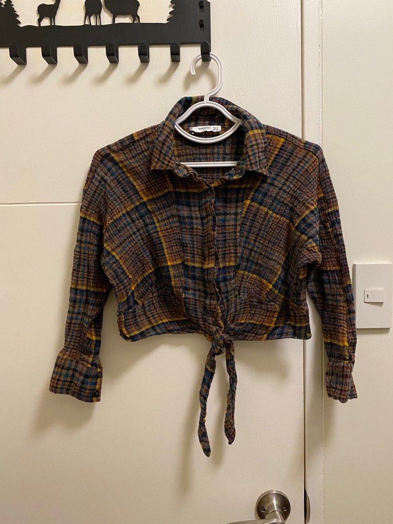 Mango plaid crop button-down (Category: Blouses) located in Quezon City. Submitted by abby11.12a (Listing ID 1360144273, Image 1). Description: Love the colors but hardly wore it because it’s a little warm With accent tie-front ribbon at the end.