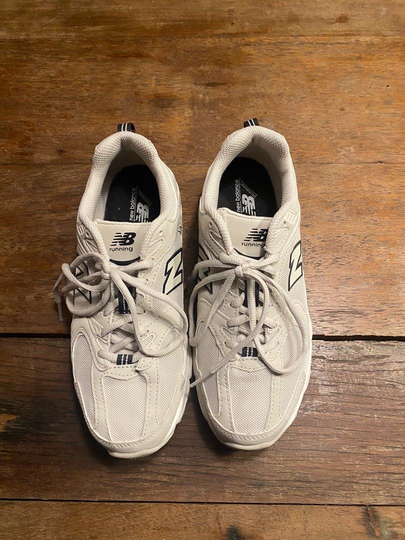 new balance sneakers (Category: Sneakers) located in Quezon City. Submitted by janialee (Listing ID 1360156873, Image 3). Description: worn once but it was rlly too big ivory color.