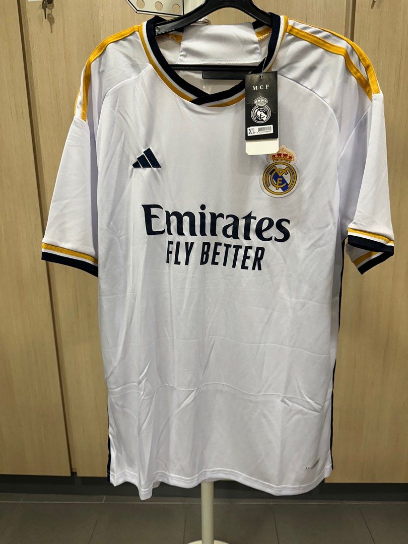 Real Madrid home Jersey (Category: Activewear) located in Singapore. Submitted by samson8930 (Listing ID 1360089141, Image 1). Description: Real Madrid home jersey Size: XL Brand new with tag PTP: 56cm Length: 77cm What you see is what you get No refund or exchange Self collect at 561591 or add $3 for mail. .