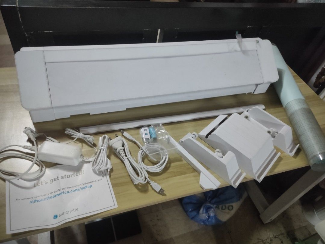 SILHOUETTE CAMEO PRO 24" (cutter plotter) (Category: Craft Supplies & Tools) located in Manila. Submitted by kayviosto66391 (Listing ID 1360133490, Image 1). Description: Silhouette Cameo Pro 24" inclusions: - Power cables, - Original blade (inside na) - Supports - Cameo Pro Cutting Mat (medyo madumi na po see images, pero ung part na may blue cover pa is unused area. You can restick it using Tulco glue if you know the process ☺️) Wala na pong bo
