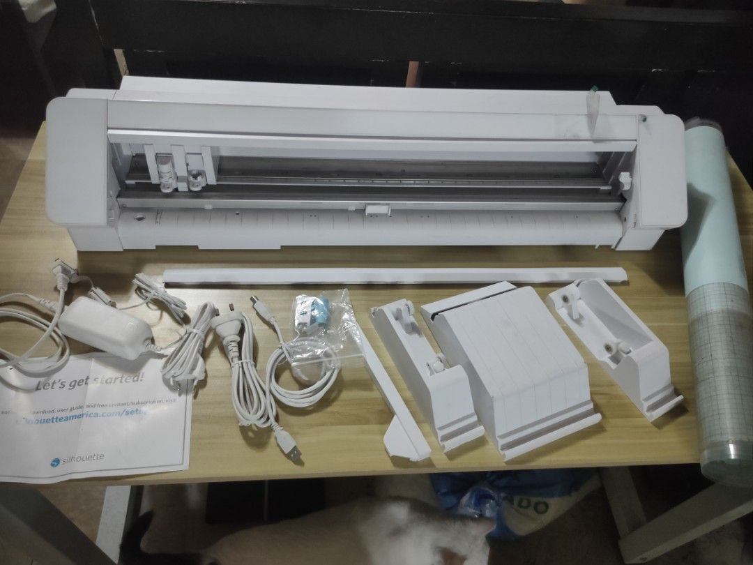SILHOUETTE CAMEO PRO 24" (cutter plotter) (Category: Craft Supplies & Tools) located in Manila. Submitted by kayviosto66391 (Listing ID 1360133490, Image 2). Description: Silhouette Cameo Pro 24" inclusions: - Power cables, - Original blade (inside na) - Supports - Cameo Pro Cutting Mat (medyo madumi na po see images, pero ung part na may blue cover pa is unused area. You can restick it using Tulco glue if you know the process ☺️) Wala na pong bo