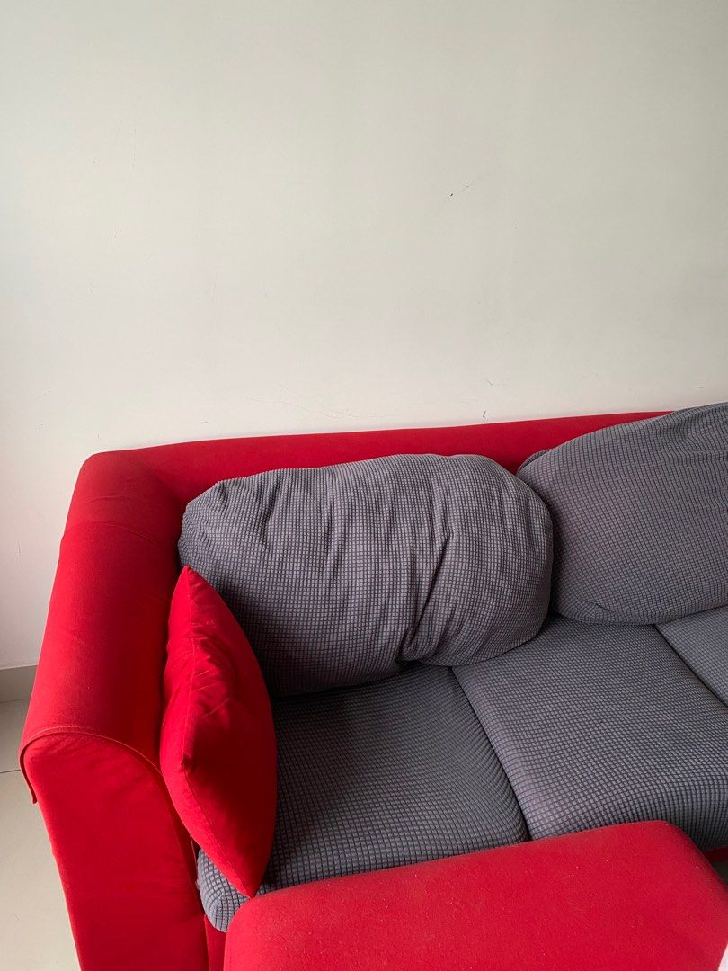 Sofas (Category: Sofas) located in Kuala Lumpur. Submitted by fikri_ramli (Listing ID 1360141746, Image 3). Description: For Sale: L-Shaped 3-Seater Sofa – Red (RM400- negotiable) Looking for a budget-friendly and stylish sofa? This L-shaped 3-seater in bold red is available for just RM400! ✅ Condition: Pre-loved, well-maintained with removable grey seat covers for added protection. ✅ Color: Striking red with grey covers for a modern touch. ✅ Sea