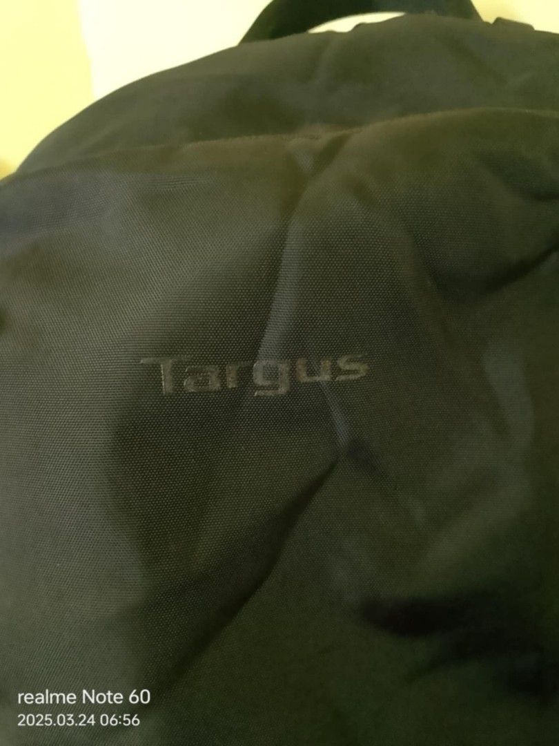 Targus Backpack (Category: Backpacks) located in Quezon City. Submitted by annyeong9 (Listing ID 1360149994, Image 2). Description: Targus Transpire Advance Backpack colored black. 15-16 in/38.1-40.6 cm. Almost new. Good for everyday use, office work and travel. P1, 200.00. See pictures for details and price..