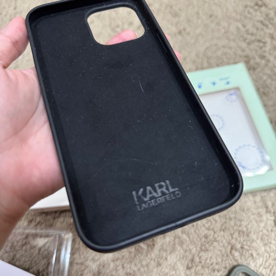12 pro max cases (Category: Cases & Sleeves) located in San Pedro. Submitted by chekwaaa (Listing ID 1360272267, Image 3). Description: AUTHENTIC CASES Off white Karl Lagerfield - with a little issue in the photo For 12 Pro max Good used condition 1,500 FREE SHIPPING.
