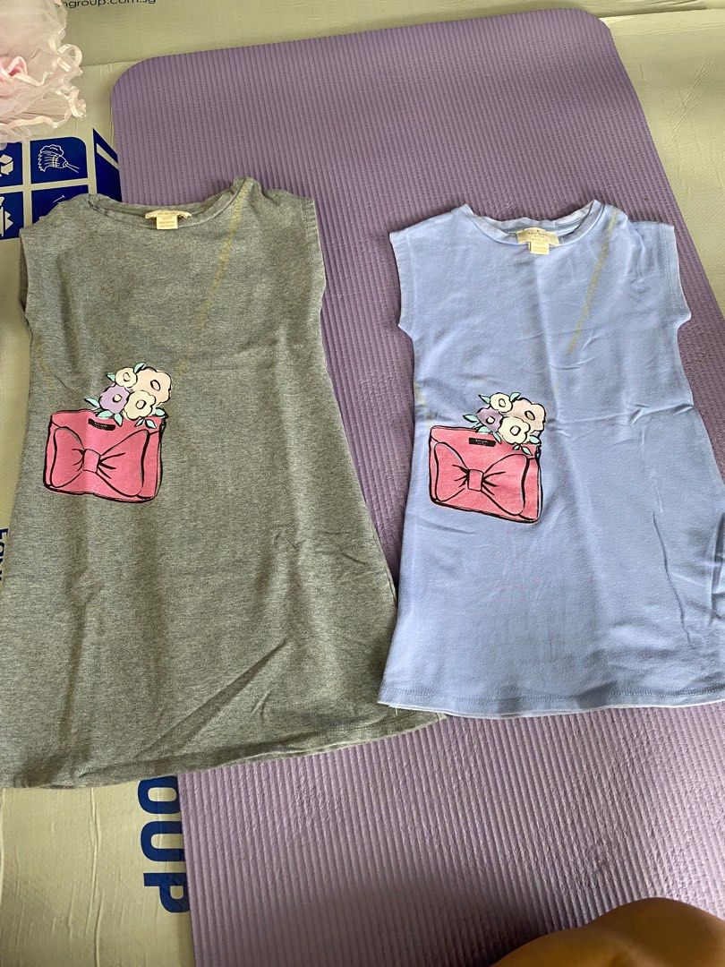 2 dresses (Category: Babies & Kids Fashion) located in Singapore. Submitted by clearing_closet_your_gem (Listing ID 1360229921, Image 1). Description: For you girls to match up. $10 for both. .