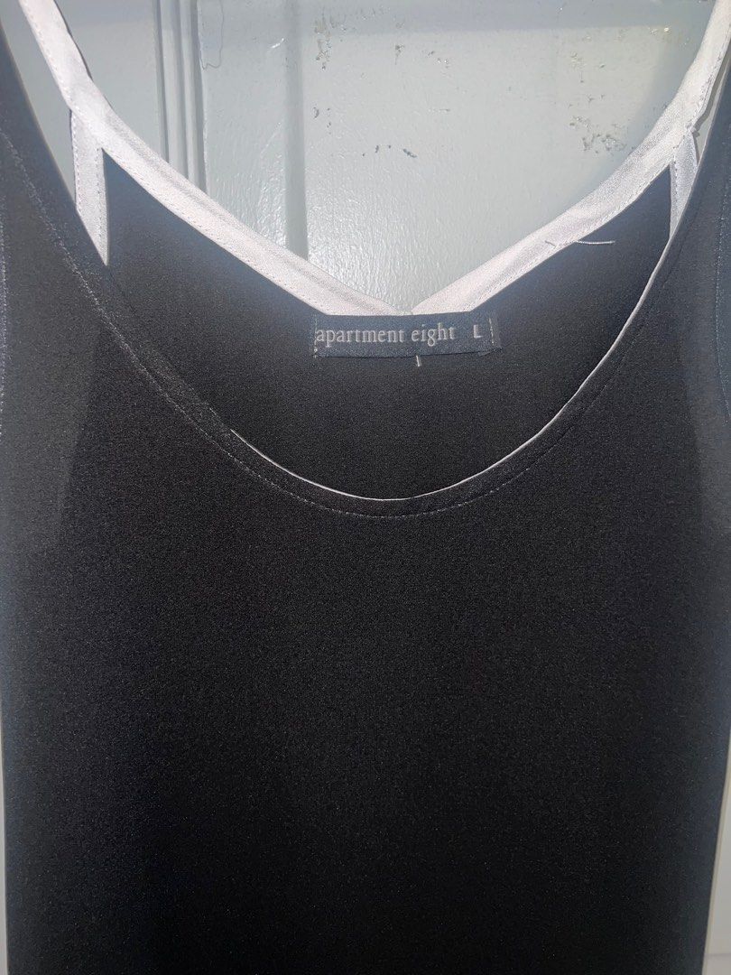 Apartment 8 Black & White Sleeveless Top (Category: Sleeveless) located in Pasig City. Submitted by lbclosetcleanup (Listing ID 1360236838, Image 3). Description: Semi sheer L on tag but fits S-M.