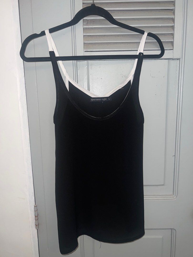 Apartment 8 Black & White Sleeveless Top (Category: Sleeveless) located in Pasig City. Submitted by lbclosetcleanup (Listing ID 1360236838, Image 1). Description: Semi sheer L on tag but fits S-M.