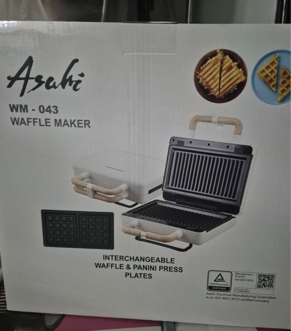 Asahi Waffle Maker WM -043 (Category: Cookware & Accessories) located in Paranaque City. Submitted by homebox.com (Listing ID 1360367653, Image 2). Description: PROMO UNTIL MAY 2026- BUY 1 and get 2nd item with a lower amount in the items for sale at 30%off. Description 2-in-1 Waffle and Panini Maker 2 X 4″ (100 x 100) waffle capacity 800W With light indicator Non-stick coated plates Elegant wooden design Interchangeable plates (waffle and panini