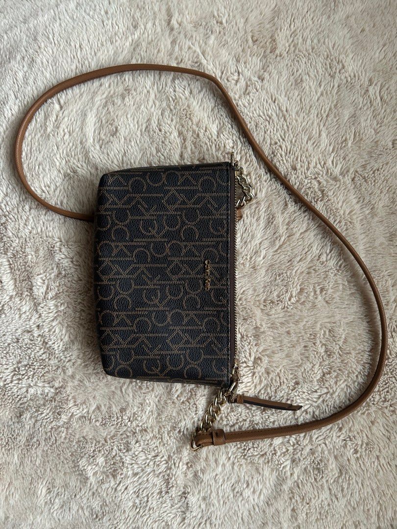 calvin klein sling bag (Category: Luxury Bags & Wallets) located in Cebu City. Submitted by powkiebear (Listing ID 1360314907, Image 2). Description: calvin klein sling bag in mint condition (used a few times only) very pretty and classy in person.