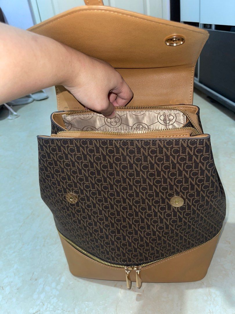 CLN backpack (Category: Backpacks) located in Quezon City. Submitted by tomiteepee (Listing ID 1360298351, Image 3). Description: Brandnew condition. Used twice lang No faded hardwares or zippers — sobrang gold pa lahat. Walang bakbak, walang anything — sobrang kinis. Giftable condition pa actually Please see photos to appreciate. Even the insides are clean and feels new. .