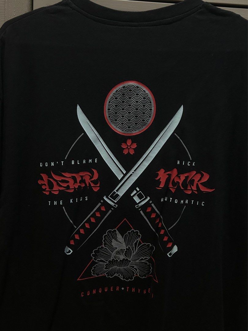 DBTK x Nick Automatic Collab Shirt (Category: Tshirts & Polo Shirts ) located in Manila. Submitted by mxveronicx (Listing ID 1360339357, Image 1). Description: DBTK x Nick Automatic Collab Shirt Size L No flaws or stains Also have the same design Size M but with minimal stain at the back RFS: Decluttering.