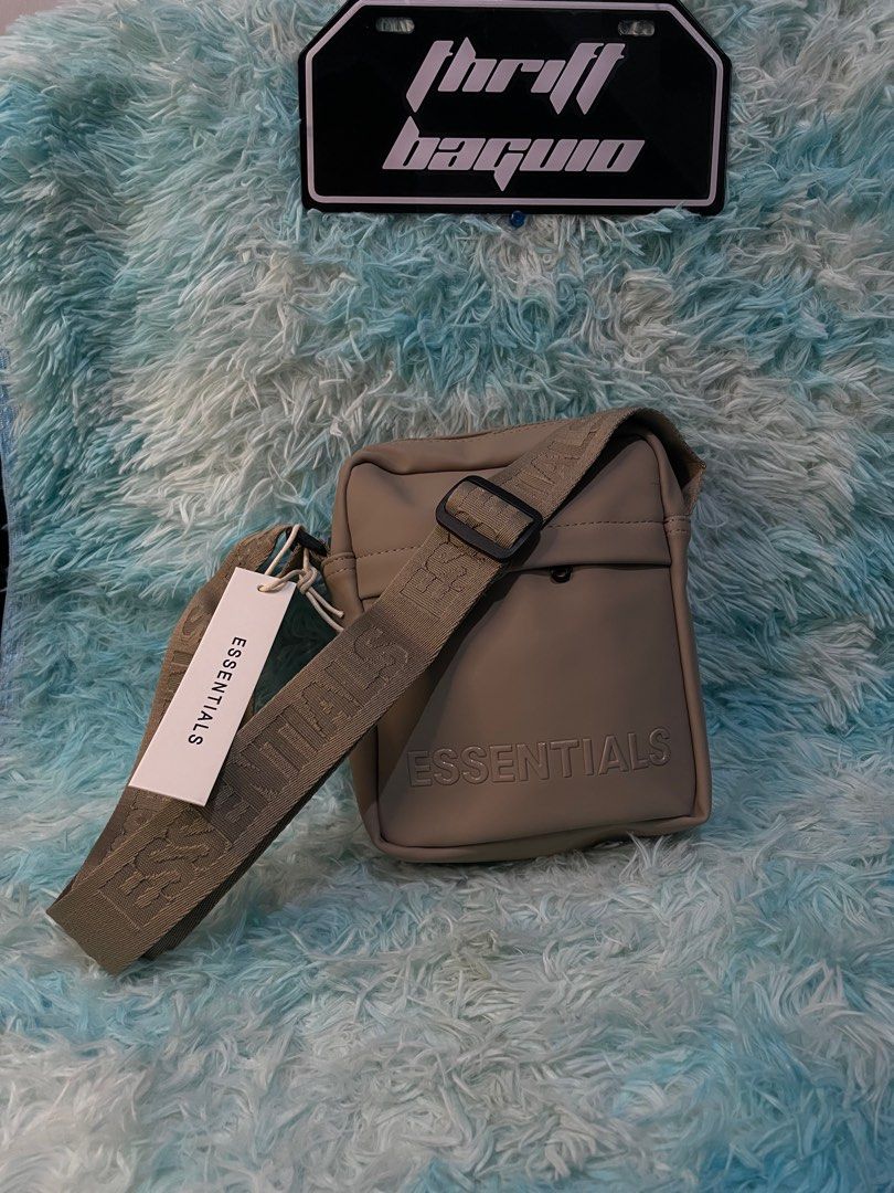 Fear of god Slingbag (Category: Luxury Bags & Wallets) located in Baguio. Submitted by thrif.tbaguio (Listing ID 1360255703, Image 2). Description: Essential khaki Slingbag Good as New No issue .