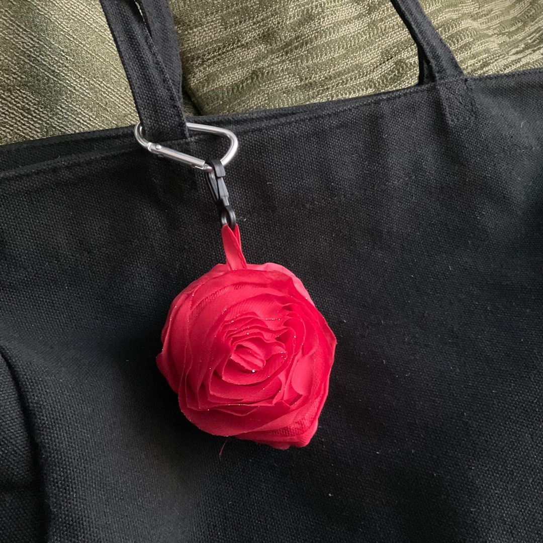 Foldable Anik-Anik Rose Eco Bag (Category: Tote Bags) located in Quezon City. Submitted by ahcodacrem (Listing ID 1360299405, Image 2). Description: Will offer for free if you buy one non-free item from me. Will sell at 20 PHP for this item only. Foldable Red Rose Eco-bag. Exterior design has slight glitters. RFS: Decluttering *Colors may not be accurate bc of lighting and photo quality taken by my phone. ORDER FORM Name: Contact number: Address: