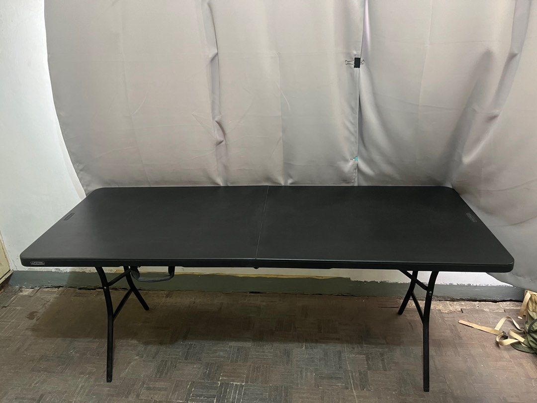 Lifetime 6ft Folding Table in Black (Category: Tables & Sets) located in Binan City. Submitted by tring_ (Listing ID 1360228421, Image 2). Description: Lifetime 6ft Folding Table in Black Used as study table only Never used outdoors No contact with food, water, or grease RFS: downgrading Payment via Gcash For pickup or car delivery 🤍.