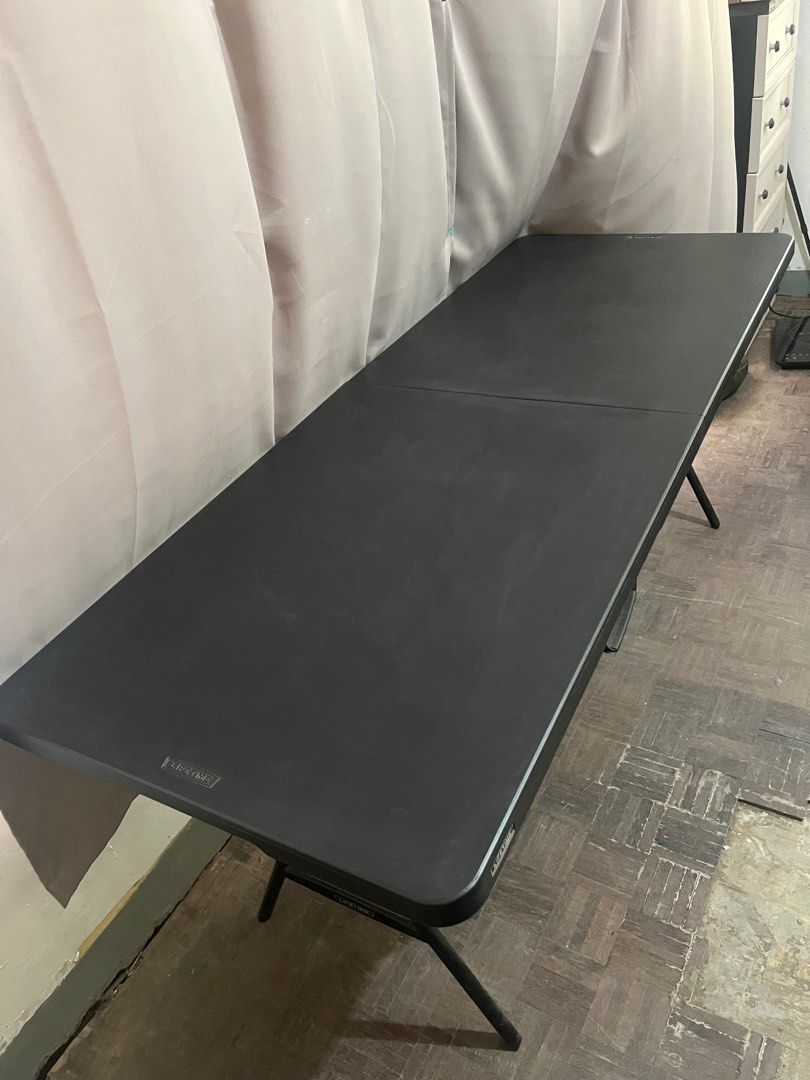 Lifetime 6ft Folding Table in Black (Category: Tables & Sets) located in Binan City. Submitted by tring_ (Listing ID 1360228421, Image 3). Description: Lifetime 6ft Folding Table in Black Used as study table only Never used outdoors No contact with food, water, or grease RFS: downgrading Payment via Gcash For pickup or car delivery 🤍.