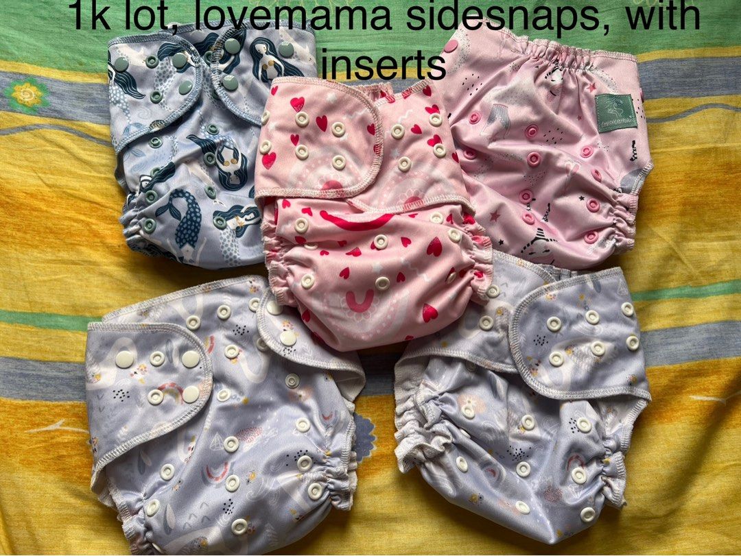 Lovemama Sidesnap Cloth Diapers (Category: Diapers & Baby Wipes) located in Bulacan. Submitted by kattydear (Listing ID 1360276460, Image 1). Description: With inserts for each diaper. Very good used condition. We love these diapers but need to clear up space. Rfs: outgrown.