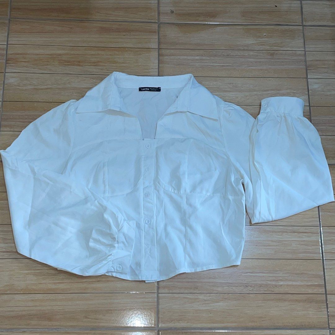 Lovito White Button Longsleeves Cropped Top (Category: Longsleeves) located in Quezon City. Submitted by devvy14 (Listing ID 1360249156, Image 3). Description: Kindly read description below 👇🏻 Size XL - See picture for measurements. ✨Used ONCE only ✨ ✨NO FLAWS✨ ✨Bought for 450 in orange app✨ These are personal pre-loved items.❤️ Please manage your expectations 🤗 📍LOCATION: ESPAÑA, MANILA 🚴🏻‍♂️DELIVERY: Lalamove/Grab express/Angkas express �