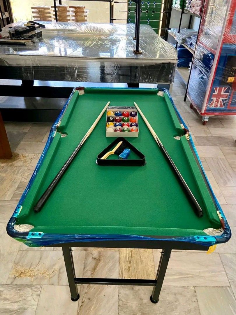 Mini Billiards 120x75cm (Category: Billiards and Bowling) located in Caloocan City. Submitted by murabilliardph (Listing ID 1360292475, Image 2). Description: Dimension: 120x63x75cm ( length x width x height ) Inclusion: 2 Cue ( 112CM) 2 Chalk 1 Brush 1 Triangle 1 Set of balls(16 balls) (38mm).