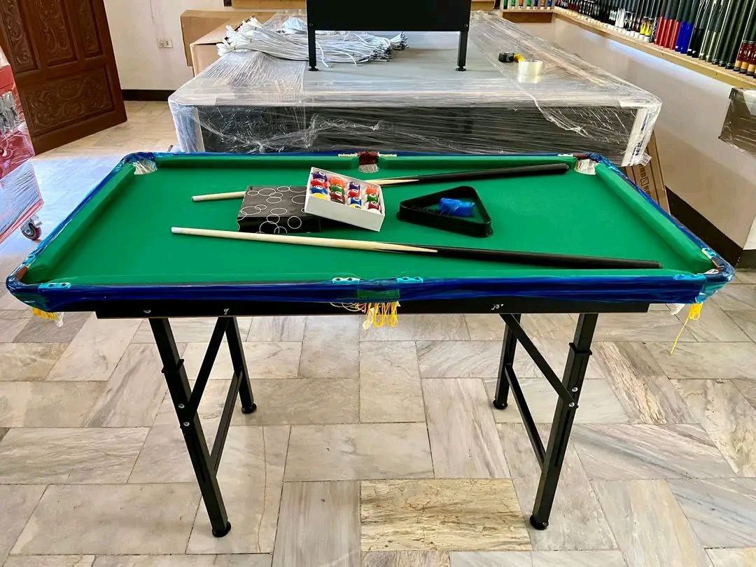 Mini Billiards 120x75cm (Category: Billiards and Bowling) located in Caloocan City. Submitted by murabilliardph (Listing ID 1360292475, Image 1). Description: Dimension: 120x63x75cm ( length x width x height ) Inclusion: 2 Cue ( 112CM) 2 Chalk 1 Brush 1 Triangle 1 Set of balls(16 balls) (38mm).