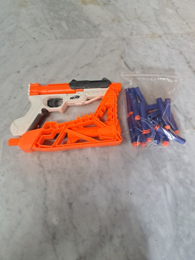 Nerf Sharpfire (Category: Toys & Games) located in Singapore. Submitted by lifestylem (Listing ID 1360275449, Image 1). Description: Include 18x Suction $2 5x Elite Blue $1.