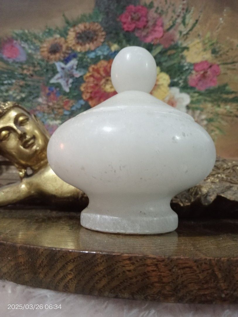 Selenite Jar with lid (Category: Precious Stones) located in Batangas. Submitted by girlmeetspurple (Listing ID 1311729054, Image 2). Description: Place your crystals inside a Selenite Round Jar with Lid to cleanse and charge them with positive energy! This exquisite Selenite is a beautiful and functional piece for your spiritual toolkit. This jar is carved from luminous Selenite, known for its serene and cleansing energy. This Selenite jar is pe