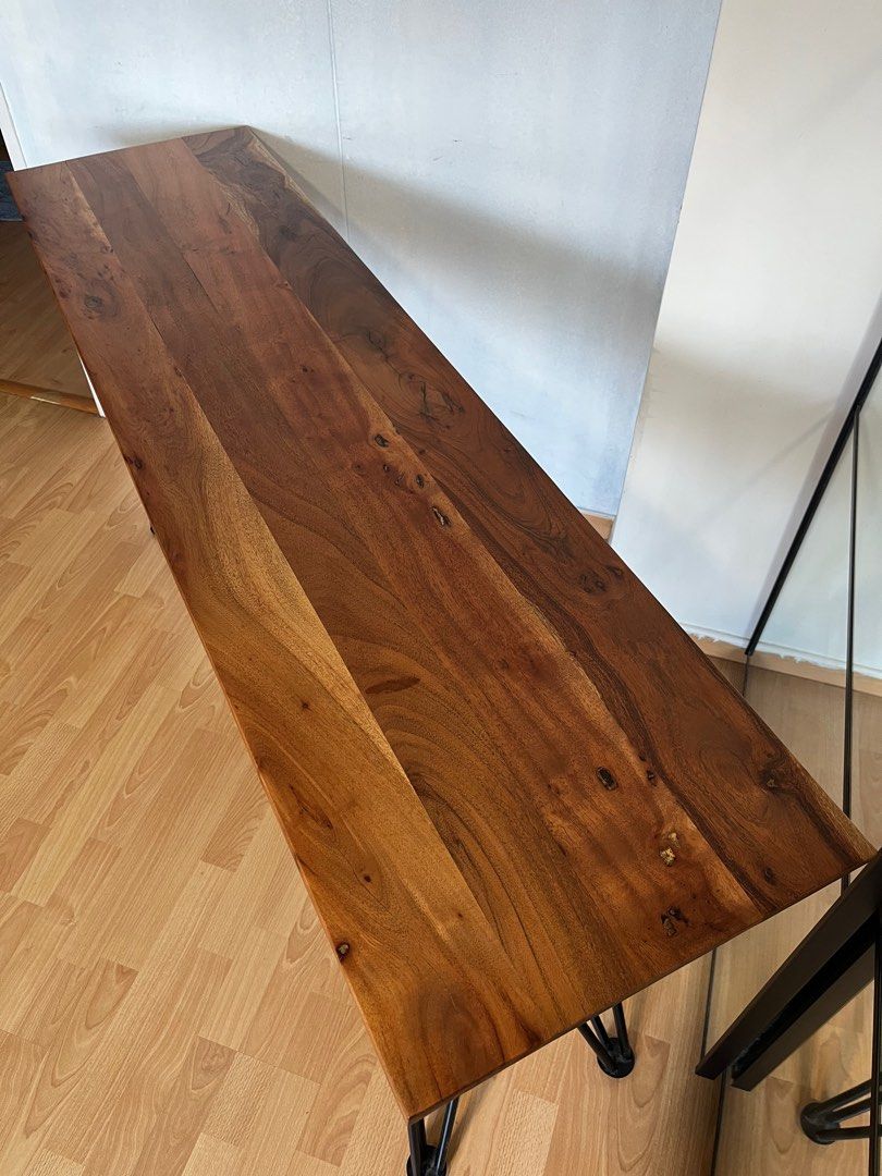 Solid Wood Console Study Table (Category: Tables & Sets) located in Singapore. Submitted by dangoyankee (Listing ID 1360286251, Image 2). Description: features •100% solid acacia hardwood. beautiful grain •recently conditioned the wood •table legs can be micro adjusted to ensure table is sturdy (last pic) •150cm x 41cm x 76cm (LWH) •can be used as a console or study table flaws •minor scratches on the surface that i can’t pick up with my camera, 