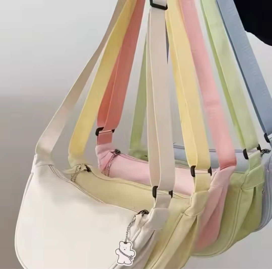 Women Shoulder Bags Solid Color Nylon Dumpling Messenger Bag (Category: Shoulder Bags) located in Paranaque City. Submitted by michelleko02 (Listing ID 1360283202, Image 2). Description: Material: nylon Size: top width 30cm, bottom width 18cm, height 16cm, thickness 9.5cm Color: white, black, green, orange #makethebest1 #sideline2 #savings3 #treasure4.
