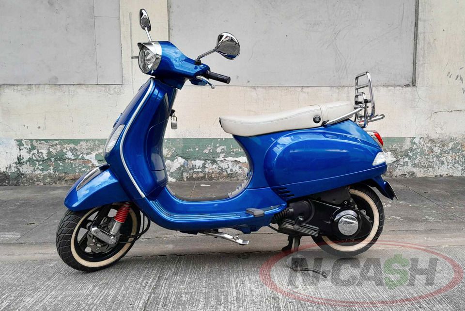 2013 Vespa LX150 IE (Category: Motorbikes for Sale) located in Makati City. Submitted by luxury_by_ncash_2 (Listing ID 1360465223, Image 1). Description: N-Cash Pawnshop "Instant Cash for Bags, Watches, Cars, and Electronics" https://www.ncash-pawnshop-philippines.com/ 2013 Vespa LX150 IE 150cc 2014 acquired YSS Suspension Good running condition 1 original brown key with metal code, 1 original blue key Complete documents PHP 118000 For more detai