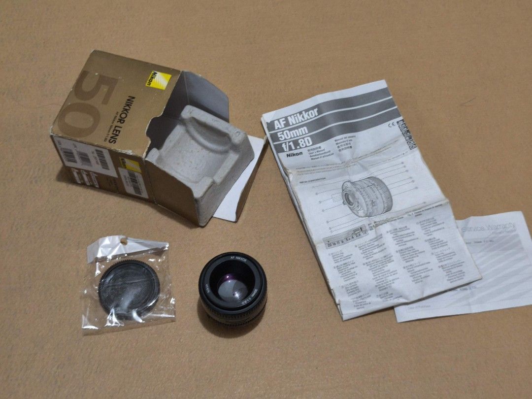 50mm Nikon AF with original box (Category: Lens & Kits) located in Taguig. Submitted by juliestjuly (Listing ID 1360474300, Image 1). Description: with camera cap lens freebie with the original box and manual.