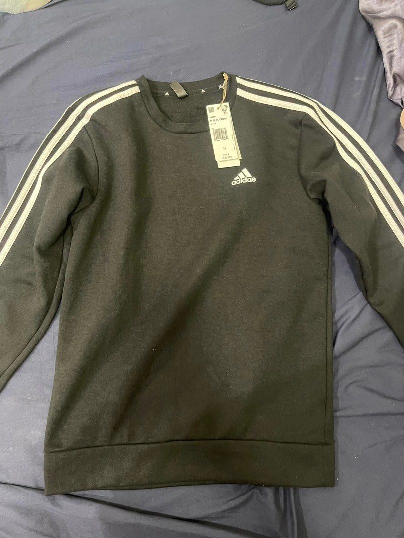 Adidas Sweater / Sweatshirt (Unisex) (Category: Coats, Jackets and Outerwear) located in Makati City. Submitted by dcnhsr (Listing ID 1360537176, Image 2). Description: - Brand new (bought from Canada through Pasabuy) - Unisex - Small (Girls) - Extra Small (Boys) - RFS: Wrong size • Buyer will shoulder the shipping fee.