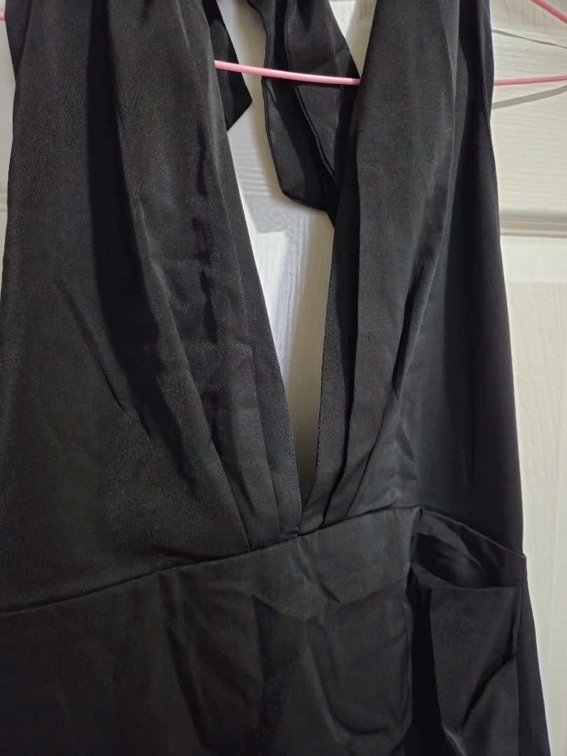 Backless Satin dress (Category: Dresses) located in Mandaluyong City. Submitted by closetcleanoutbykath (Listing ID 1360446554, Image 3). Description: Super cute black Satin dress perfect for date night never been used kasi too short for me Size si Medium but mas reco for small petite girl model height is 5'6.