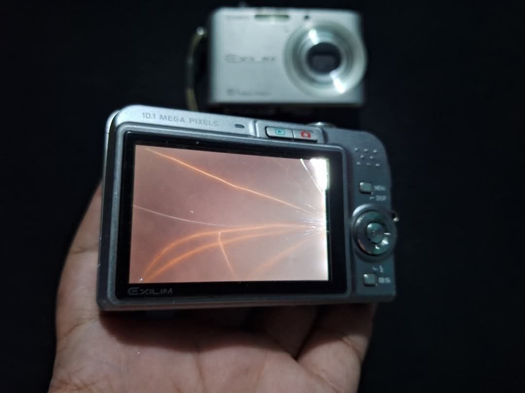 Casio Exilim Digicams (Category: Cameras) located in Quezon City. Submitted by clickph (Listing ID 1360559188, Image 3). Description: Casio Exilim Z1080 and Z1000 Nakakakuha pictures Z1080- basag lang LCD, may kasama nang lcd replacement worth 1600 Z1000- glitch, magandang maganda condition kasama battery, again may kasamang screen replacement na worth 1600 2500 na lang for both, kasama screen saka battery lalamove within ncr, ikaw na mag book.