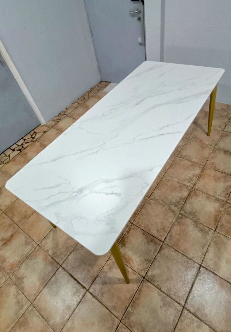 Dining Table (Category: Tables & Sets) located in Singapore. Submitted by melrysha (Listing ID 1360413487, Image 2). Description: dining table only. self collect at pasir ris dr 10. The dimensions is 180 x 80 x 75. scratch and high temperature resistant sintered stone table..