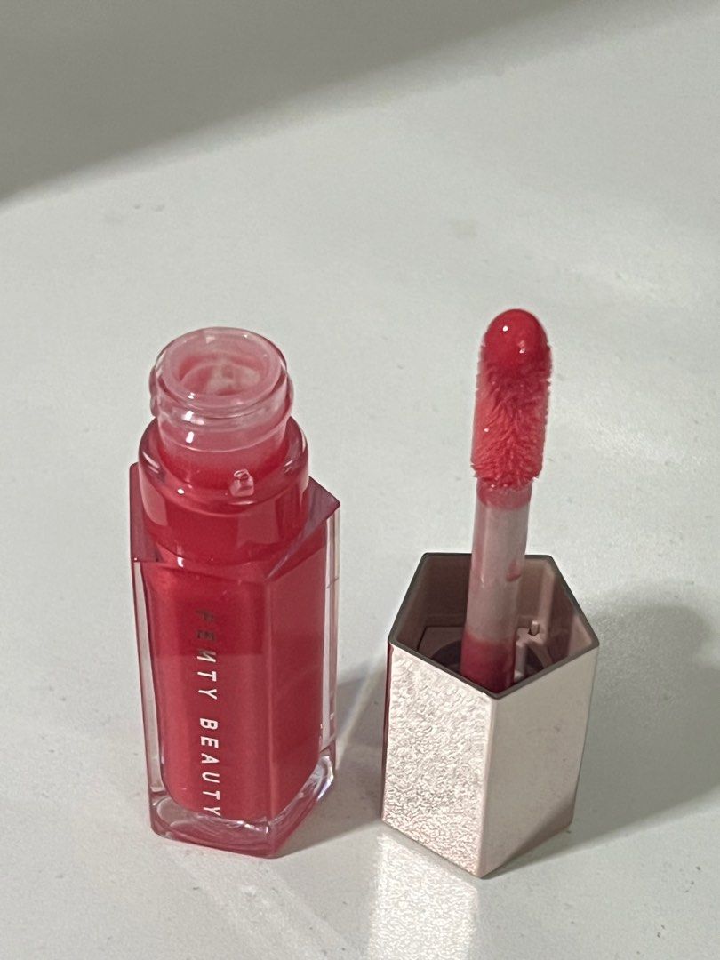 Fenty Beauty Gloss Bomb Dragon Miami (Category: Makeup) located in Paranaque City. Submitted by discodaydream (Listing ID 1360563315, Image 3). Description: Fenty Beauty Gloss Bomb in NEW SHADE: Dragon Mami (see last pics for when worn and item from others) Full size 9ml 100% guaranteed authentic Bought by my sister in Sephora Dubai Brand new, swatched once only Sep is around P1600/1700.