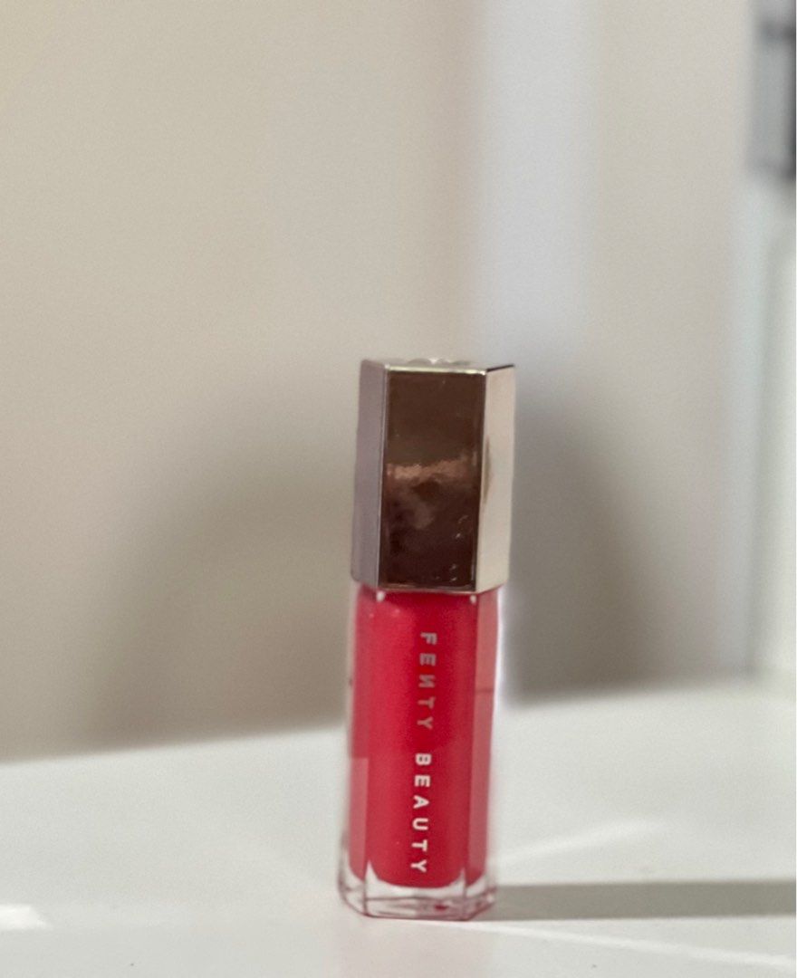 Fenty Beauty Gloss Bomb Dragon Miami (Category: Makeup) located in Paranaque City. Submitted by discodaydream (Listing ID 1360563315, Image 1). Description: Fenty Beauty Gloss Bomb in NEW SHADE: Dragon Mami (see last pics for when worn and item from others) Full size 9ml 100% guaranteed authentic Bought by my sister in Sephora Dubai Brand new, swatched once only Sep is around P1600/1700.