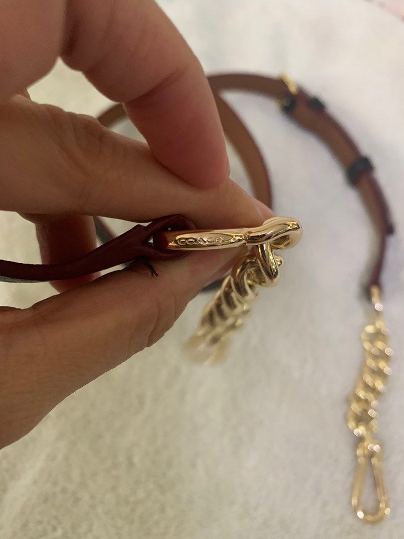 Kept Unused Original Coach Reversible Thin Strap with Gold Chain (Category: Other Accessories) located in Muntinlupa City. Submitted by kibscollection03 (Listing ID 1360434230, Image 2). Description: Reversible leather thin strap- Black and Brown 📍Alabang, Muntinlupa 💰Maya / BPI / Unionbank / Seabank 🛵: COD via Lalamove / Grab for nearby areas 🚚: Accepts Cod/ COP via LBC. Regular shipping via JRS. ✅: Open for meet ups within Alabang-Biñan Lag