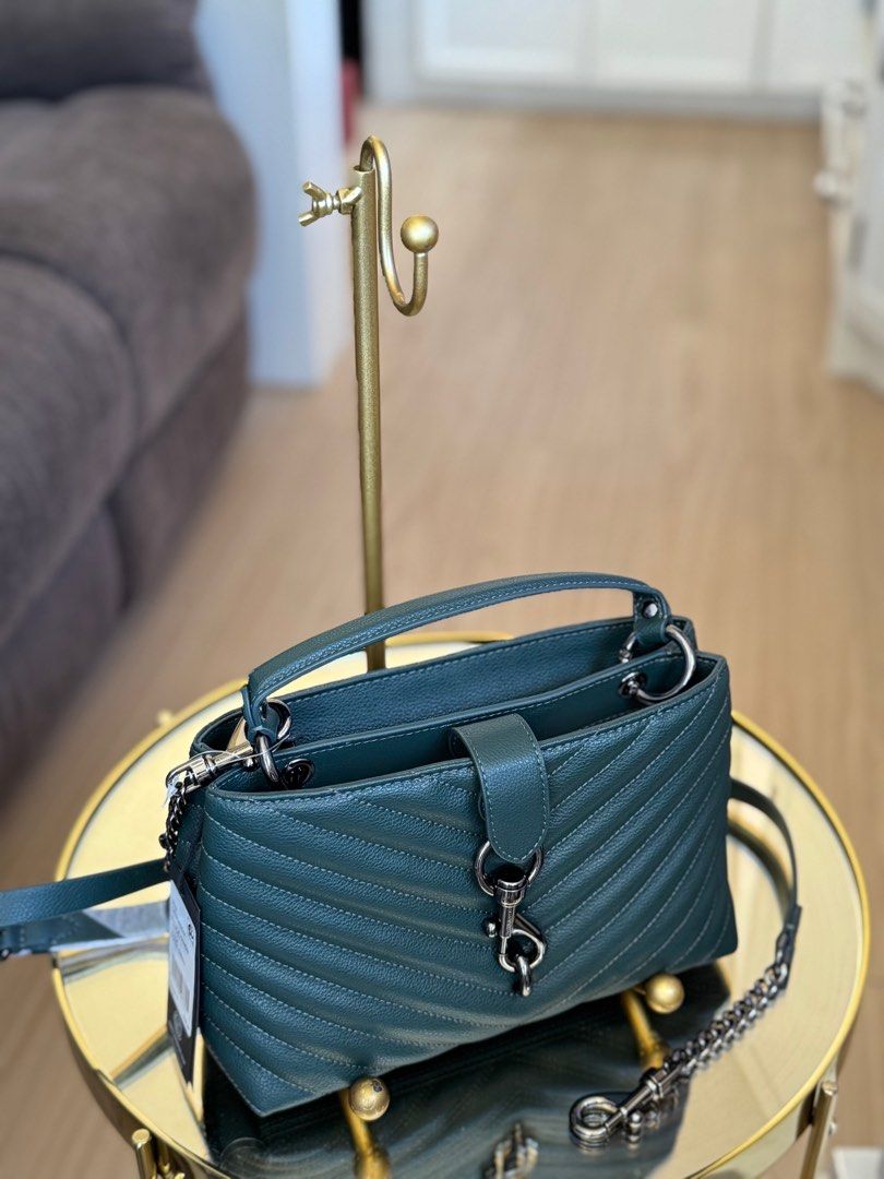 ON HAND: Rebecca Minkoff Edie Medium Top Handle Satchel Shoulder Crossbody Bag (Category: Cross-body Bags) located in Pasig City. Submitted by lizredclosetph (Listing ID 1360561900, Image 2). Description: ON HAND: Rebecca Minkoff Edie Medium Top Handle Satchel Top handle, 4” drop Removable, adjustable crossbody strap, 13.5” to 20.5” drop Can be worn as a crossbody or handbag Dimensions: 10.5”W x 3.5”D x 6.3”H Magnetic snap closure Interior zip co